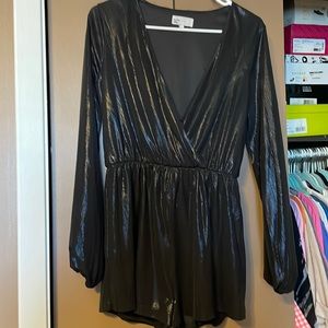 by the way. Black shiny romper